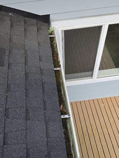 Roof edge and gutter line where water drains off an Everett, WA home
